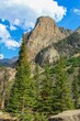Vertical shot of a high rocky mountain, beautiful nature scenery