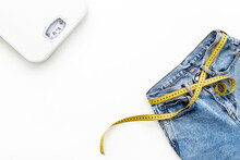 Jeans With Measuring Tape Belt Slimming With Scales. Weight Loss Concept