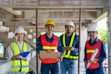 Team Of Civil Engineer Manager, Maintenance Supervisor, Professional Technician Foreman Together With Safety Operator Inspect And Discuss The Infrastructure Of Building Construction Progress On Site