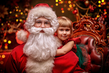  child hugging santa