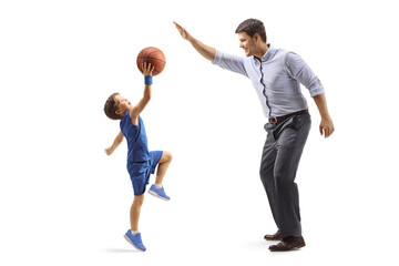 Sticker - Full length profile shot of a father and son playing basketball