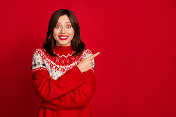 Sticker - Photo of excited impressed astonished girl straight hairstyle dressed red sweater indicating empty space isolated on red color background