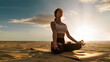 Young woman meditating in lotus yoga pose on beach