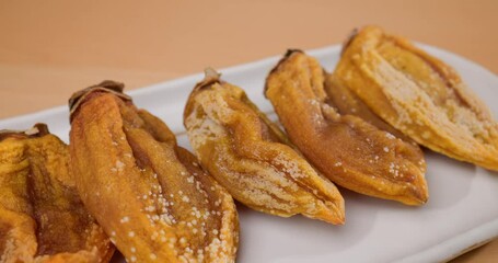 Wall Mural - Dried persimmon on the plate