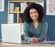 © Simamkele K/peopleimages.com - Black woman, startup business and portrait of leader, manager or boss at her desk with a laptop at marketing agency or office. Portrait of female entrepreneur happy about career choice and success