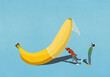 © fStop - Couple placing condom on large banana