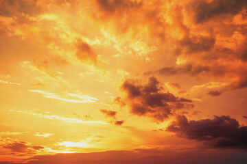 Poster - Golden cloudy sky at sunset. Sky texture, abstract nature background