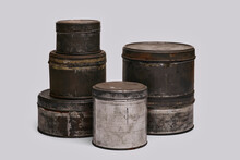 Old Paint Tins On White Background
