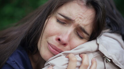 Wall Mural - Sad woman suffering from depression crying on friend shoulder. Suffering person negative emotion. Closeup face