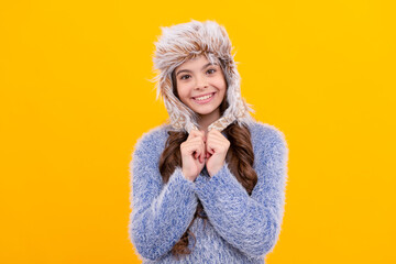 Sticker - female fashion model. teen girl in knitwear on yellow background. portrait of child