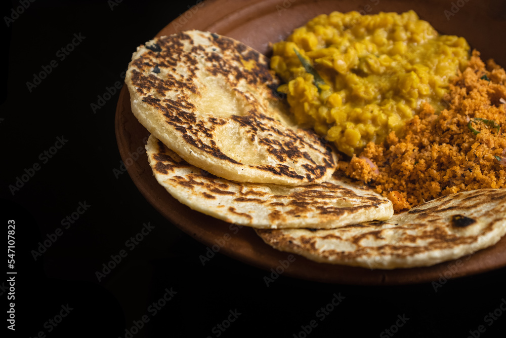 Sri Lankan style coconut roti bread with coconut sambol and dhal curry ...