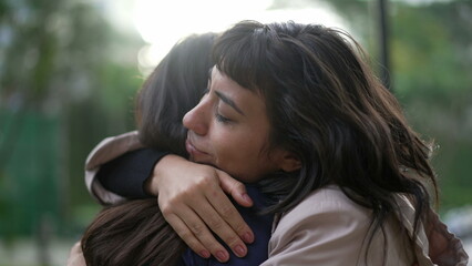 sympathetic woman hugging friend with empathy and support. friendship concept between two best frien