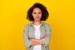 © deagreez - Photo of cute young woman wavy hair crossed arms confident entrepreneur dressed stylish khaki look isolated on yellow color background