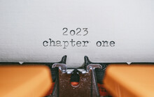Old Typewriter With Following Text On Paper - 2023 Chapter One. New Years Concept