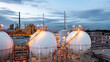 © Kalyakan - Gas storage sphere tank in petrochemical industry zone with oil and gas refinery factory plant petrochemical industry and oil storage tank background, Oil refinery at twilight.