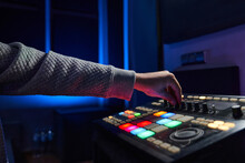 Anonymous Professional Audio Engineer Mixing Sound During Recording In Studio