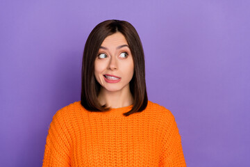 Poster - Portrait of minded clueless person grin teeth look empty space contemplate isolated on purple color background