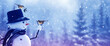 Merry christmas and happy new year greeting card with copy-space.Happy snowman standing in winter  landscape.Snow background