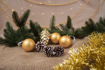 Wall Mural - Christmas tree decorations on a brown background