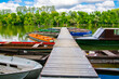 © belizar - Boats and pier on the river of Tisza
