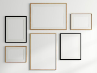 Wall Mural - gallery wall mockup, blank photo frame on white background, frame mockup, 3d render