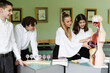 © Rabizo Anatolii - Pupils at biology lesson study internal organs at the educational dummy manikin in classroom. Schoolchildren learning in practice anatomy lesson at school.