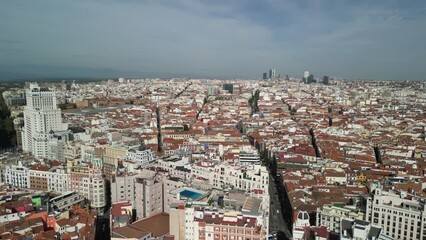 Canvas Print - Madrid, Spain - October 29, 2022: Aerial view of city landmarks and buildings on a sunny autumn day