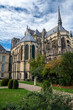 View from back side on gothic Roman Catholic cathedral church Notre-Dame in central part of old French city Reims, France