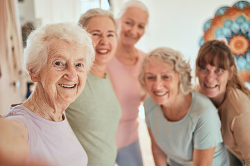 Wall Mural - Elderly woman, friends and yoga selfie for healthy wellness, zen or fun spiritual training together at the studio. Portrait of happy senior women with smile for yoga class, photo or social activity