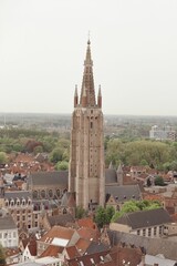 Wall Mural - Aerial view of church tower in Bruges