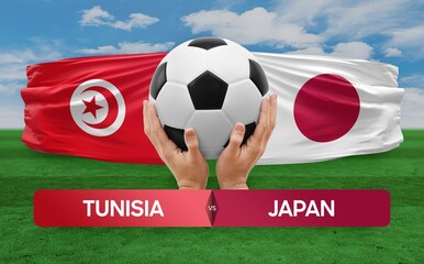 Tunisia vs Japan national teams soccer football match competition concept.