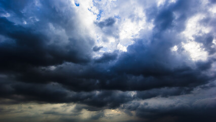 Aufkleber - The dark sky with heavy clouds converging and a violent storm before the rain.Bad or moody weather sky and environment. carbon dioxide emissions, greenhouse effect, global warming, climate change