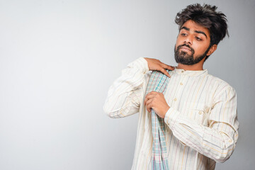 Portrait of an happy Indian farmer in rural India concept. Standing in the white background