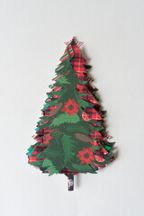 Canvas Print - pile of holiday paper tree designs on blank paper