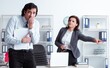 © Elnur - Old female boss and young male employee in the office