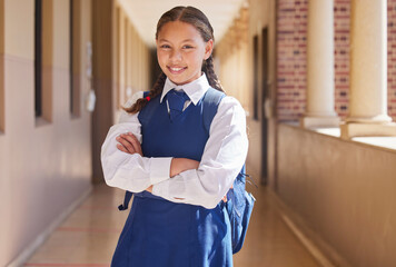 Wall Mural - Girl portrait, student and education of a child ready for morning class, development and learning. Happy face, proud and smile of a kid before study hall, scholarship work and youth studying