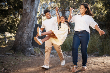 Canvas Print - Family, nature and parents holding hands with girl enjoying holiday, weekend and summer vacation together. Love, happiness and mom and dad lifting young child playing, walking and bonding in park