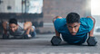 © Irshaad M/peopleimages.com - Fitness, dumbbell weights and men doing a push up exercise for strength, health and wellness in a gym. Sports, motivation and athletes doing a workout or training routine together in a sport center.