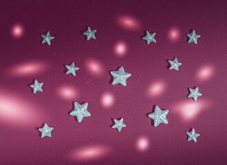 Wall Mural - Decorative silver stars and circles of light on dark red background