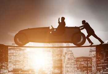 Wall Mural - Teamwork concept with businessman pushing car