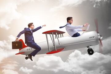 Wall Mural - Businessman flying on vintage old airplane