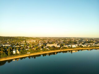 Poster - Aerial view of the Bonn city on the waterfront at calm sunset