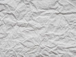 © Dmytro Synelnychenko - Grey crumpled paper texture. Page or sheet for interior and exterior decoration. Background for handcrafts, new year designs decoration, text, lettering, wall screen saver. Blank page sheet for decor.
