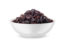 Black Raisin In White Bowl Isolated On White. Front View.
