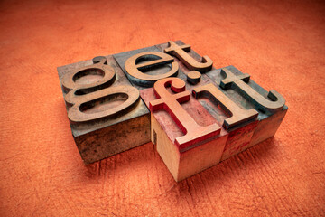 Poster - get fit motivational concept - macro shot of word abstract in letterpress wood type blocks against textured, bark paper, fitness and lifestyle