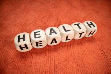 Poster - health word in letter cubes, macro shot, lifestyle concept