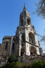 Wall Mural - The Church of Our Lady of the Holy Cross of Menilmontant- Notre-Dame-de-la-Croix de Menilmontant in French is a Roman Catholic parish church located on Menilmontant, Paris, France.