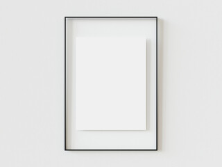 Close up black picture frame, realistic vertical photo frame, A4. Empty white picture frame mockup template isolated on white wall indoors. Vector illustration. 3d illustration