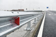Brand new metallic road barrier for traffic safety on a new constructed road