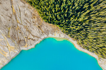 Wall Mural - drone view of the lake and forest in the glacier valley. view of the moraines. landscape from the ai